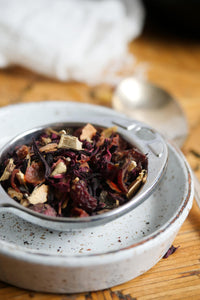 Wild berry organic tea in tea strainer